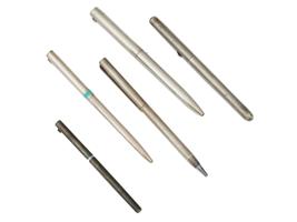 FIVE SILVER AND GOLD PENS BY TIFFANY AND CO