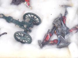 ANTIQUE MILITARY TOY SOLDIERS AND ARTILLERY PIECES
