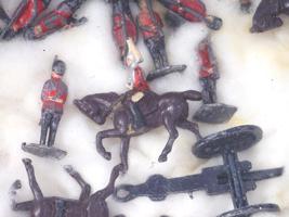 ANTIQUE MILITARY TOY SOLDIERS AND ARTILLERY PIECES