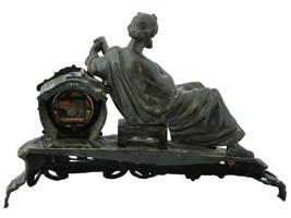 RHYTHM QUARTZ SCULPTURAL GILT BRONZE MANTLE CLOCK