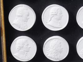 COLLECTION OF PLASTER CAMEO PORTRAIT MEDALLIONS FRAMED