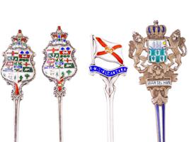 COLLECTION OF STERLING SILVER AND ENAMEL SPOONS