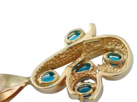 14K YELLOW GOLD AND OVAL BLUE TOPAZ STONES PENDANT