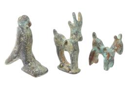 THREE SMALL ANCIENT ROMAN BRONZE AMULETS PIERCED