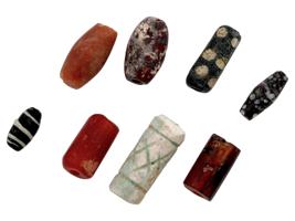 ANCIENT MULTICOLOR GLASS AND CARVED STONE BEADS