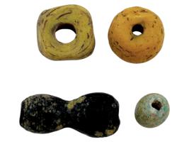 ANCIENT MULTICOLOR GLASS AND CARVED STONE BEADS