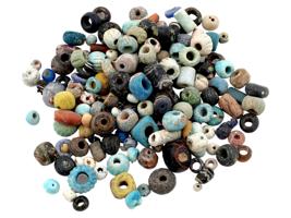 ANCIENT MULTICOLOR GLASS AND CARVED STONE BEADS