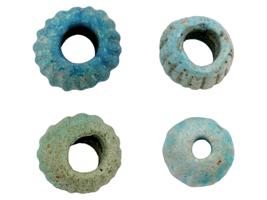 ANCIENT MULTICOLOR GLASS AND CARVED STONE BEADS