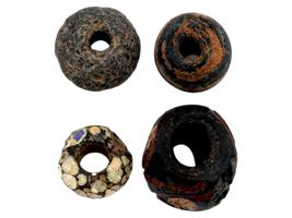 ANCIENT MULTICOLOR GLASS AND CARVED STONE BEADS