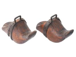 PAIR OF ANTIQUE CARVED WOOD STIRRUPS WITH IRON MOUNTS