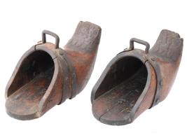 PAIR OF ANTIQUE CARVED WOOD STIRRUPS WITH IRON MOUNTS