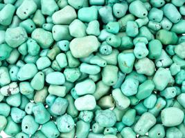 COLLECTION OF HUGE DRILLED GREEN TURQUOISE BEADS