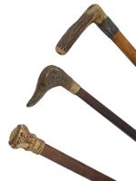 THREE WOODEN WALKING CANES WITH SILVER KNOBS