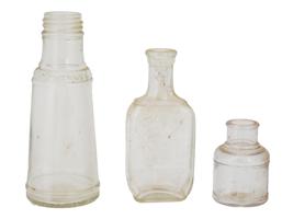 VINTAGE GROUP OF MINIATURE BOTTLES AND WINE GLASS