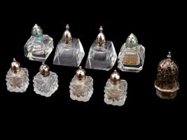 9 VINTAGE GLASS AND STERLING SILVER SALT SHAKERS