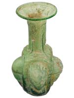 ANCIENT ROMAN GLASS VASE WITH RELIEF FACE IMAGES