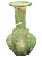 ANCIENT ROMAN GLASS VASE WITH RELIEF FACE IMAGES