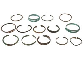 GROUP OF ANCIENT BRONZE WRAP AND OPEN BANGLE BRACELETS