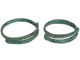 GROUP OF ANCIENT BRONZE WRAP AND OPEN BANGLE BRACELETS