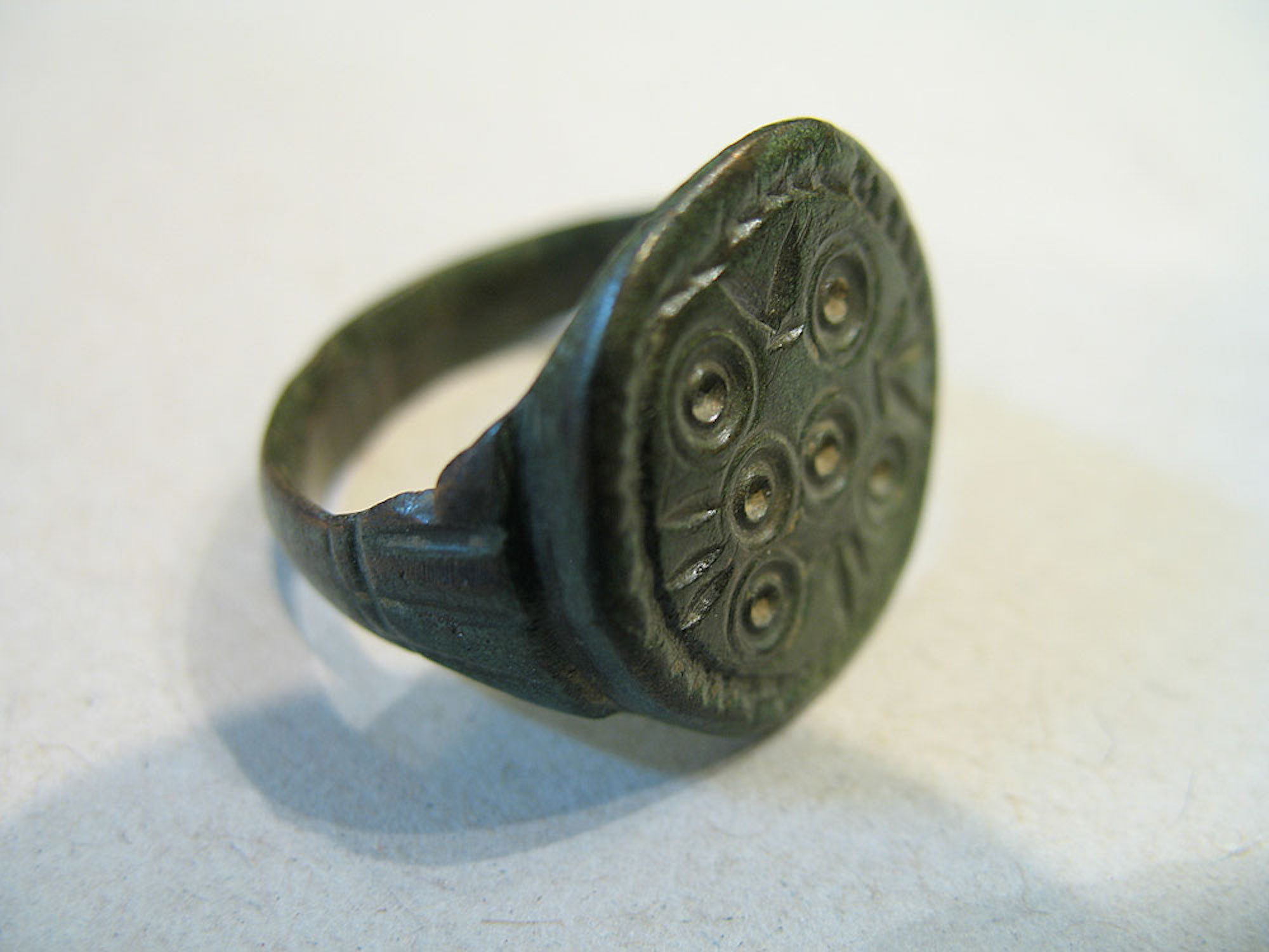 BRONZE RING WITH ENGRAVING. PIC-3