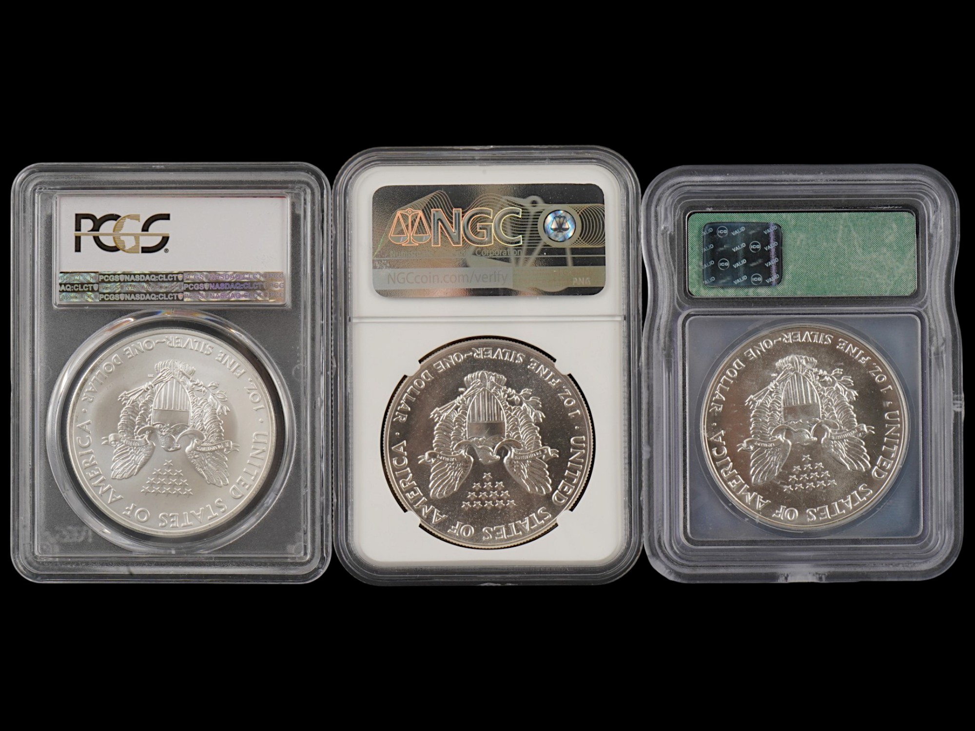 THREE VINTAGE AMERICAN SILVER EAGLE COINS GRADED PIC-2