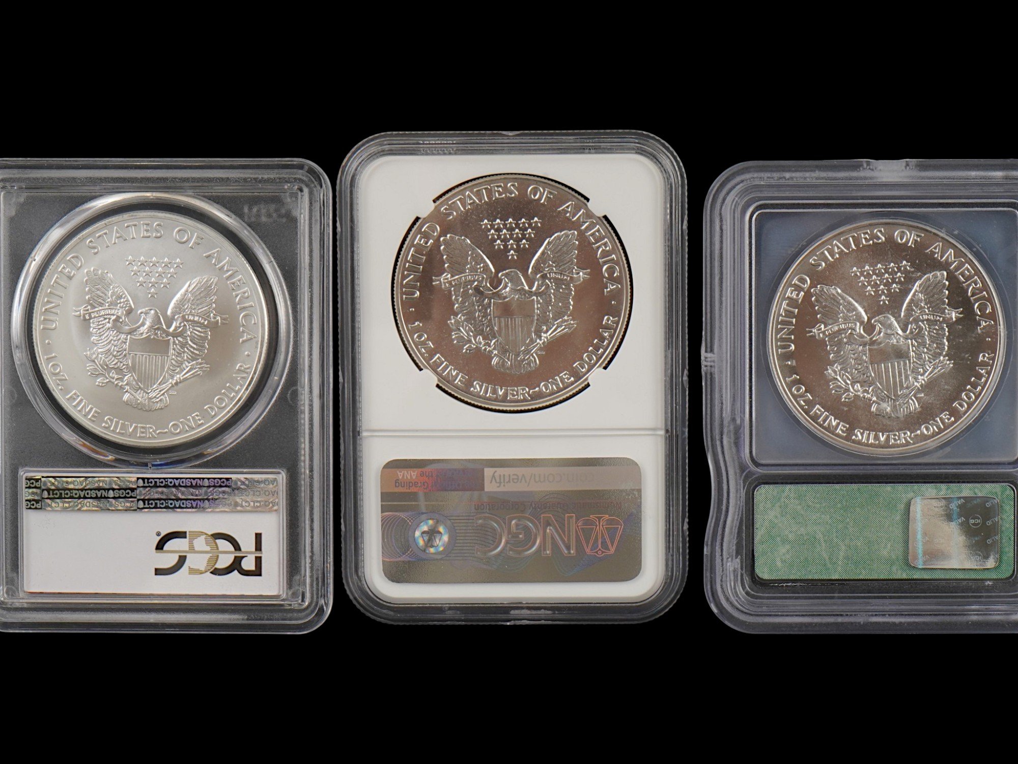 THREE VINTAGE AMERICAN SILVER EAGLE COINS GRADED PIC-1