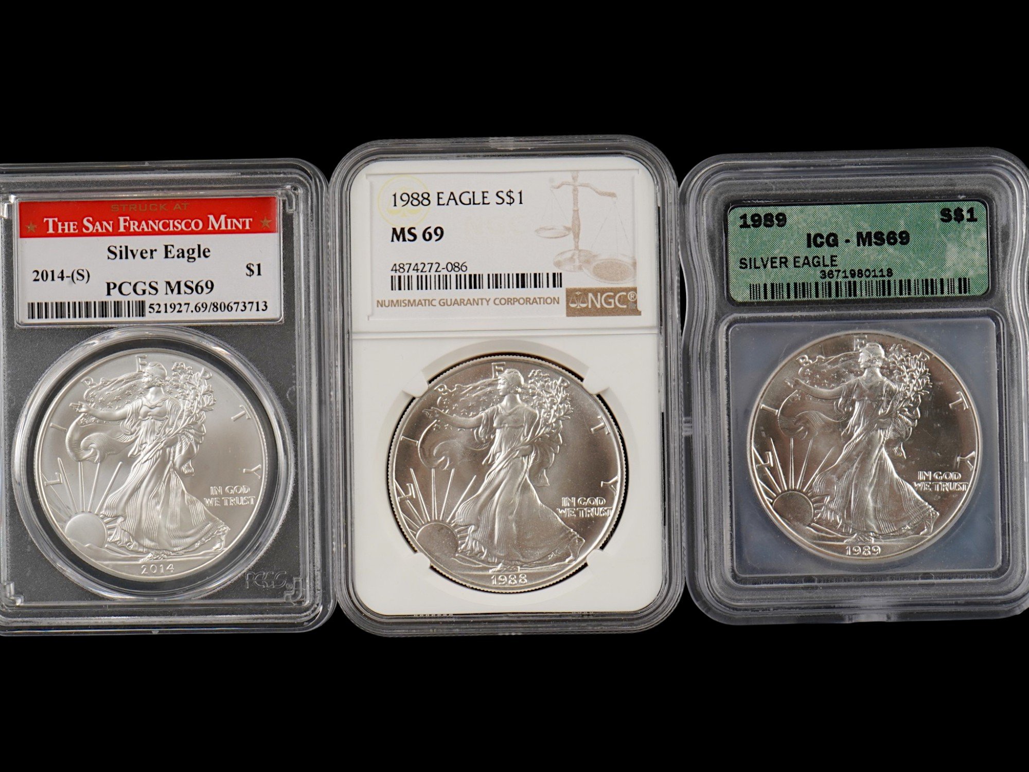 THREE VINTAGE AMERICAN SILVER EAGLE COINS GRADED PIC-3