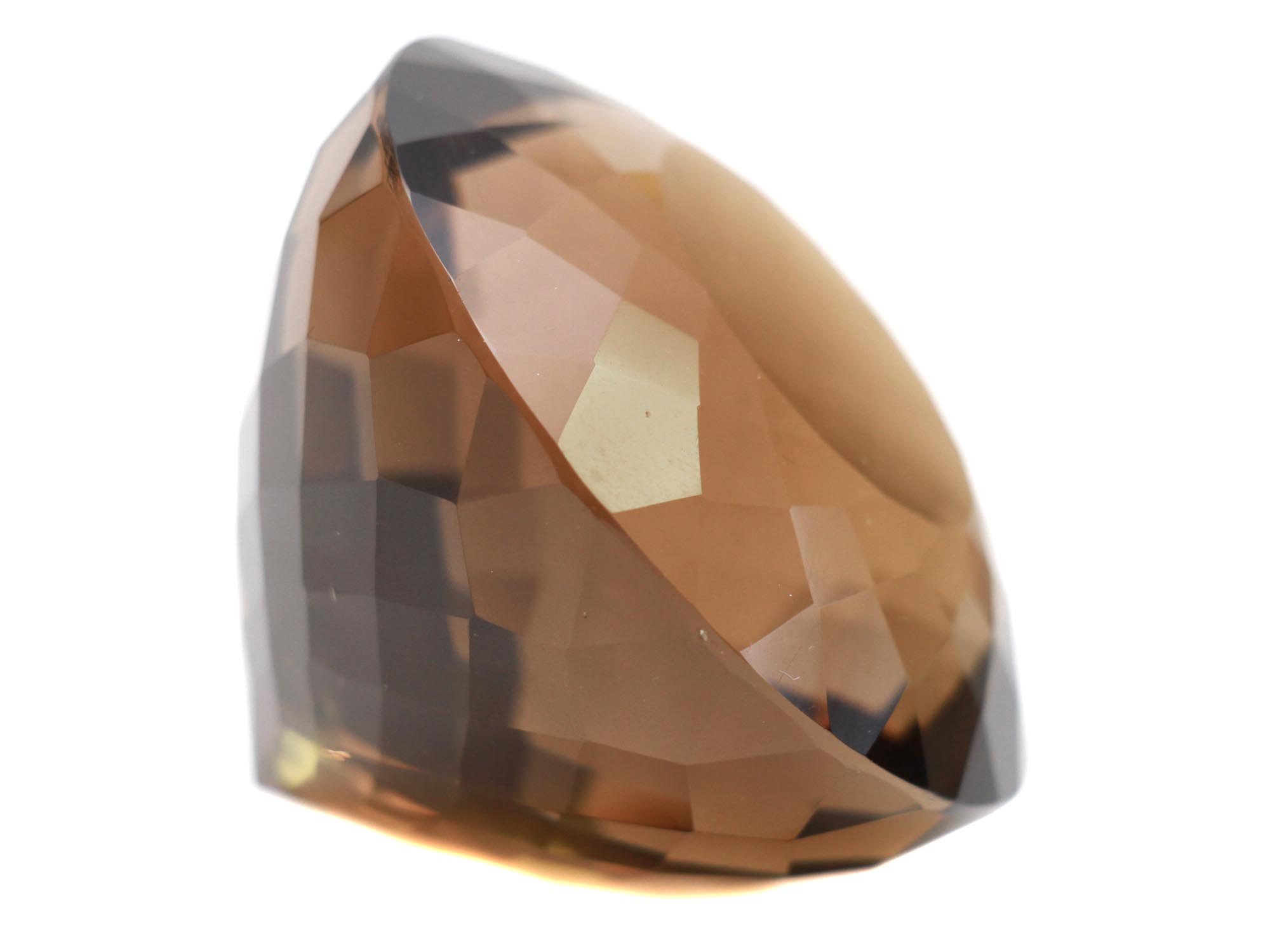 A LARGE NATURAL SMOKY GREY FACETED TOPAZ PIC-3