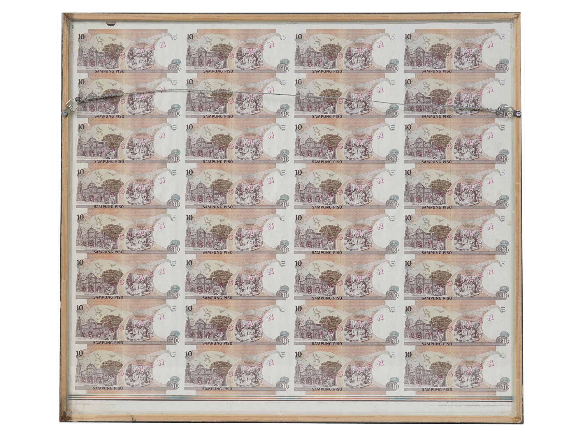 AN UNCUT SHEET OF PHILIPPINE TEN-PESO BANKNOTES PIC-1