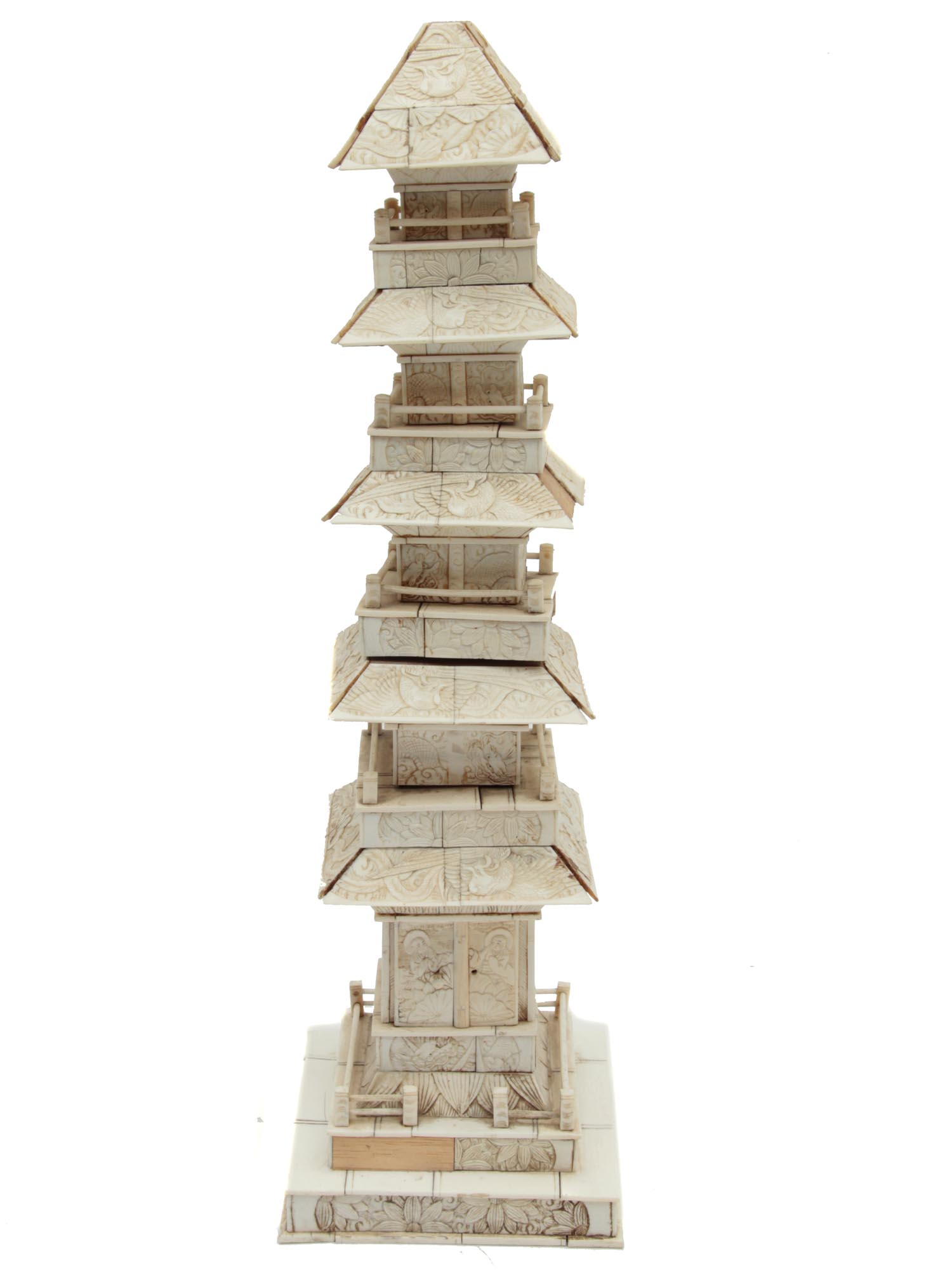 A JAPANESE CARVED IVORY MODEL OF A PAGODA PIC-0