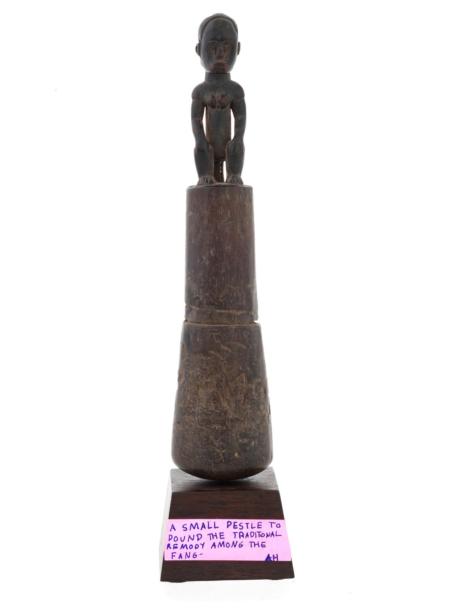 AFRICAN CARVED WOOD PESTLE WITH A YOMBE FIGURE ON TOP PIC-1