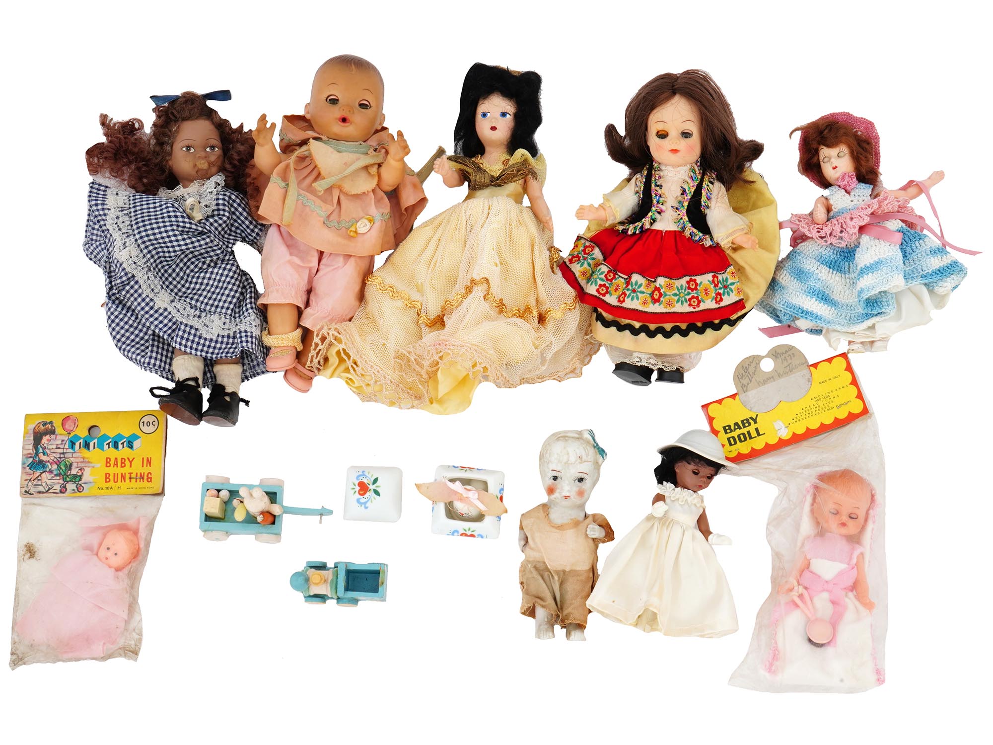 COLLECTION OF VINTAGE PORCELAIN DOLLS IN OUTFITS PIC-1