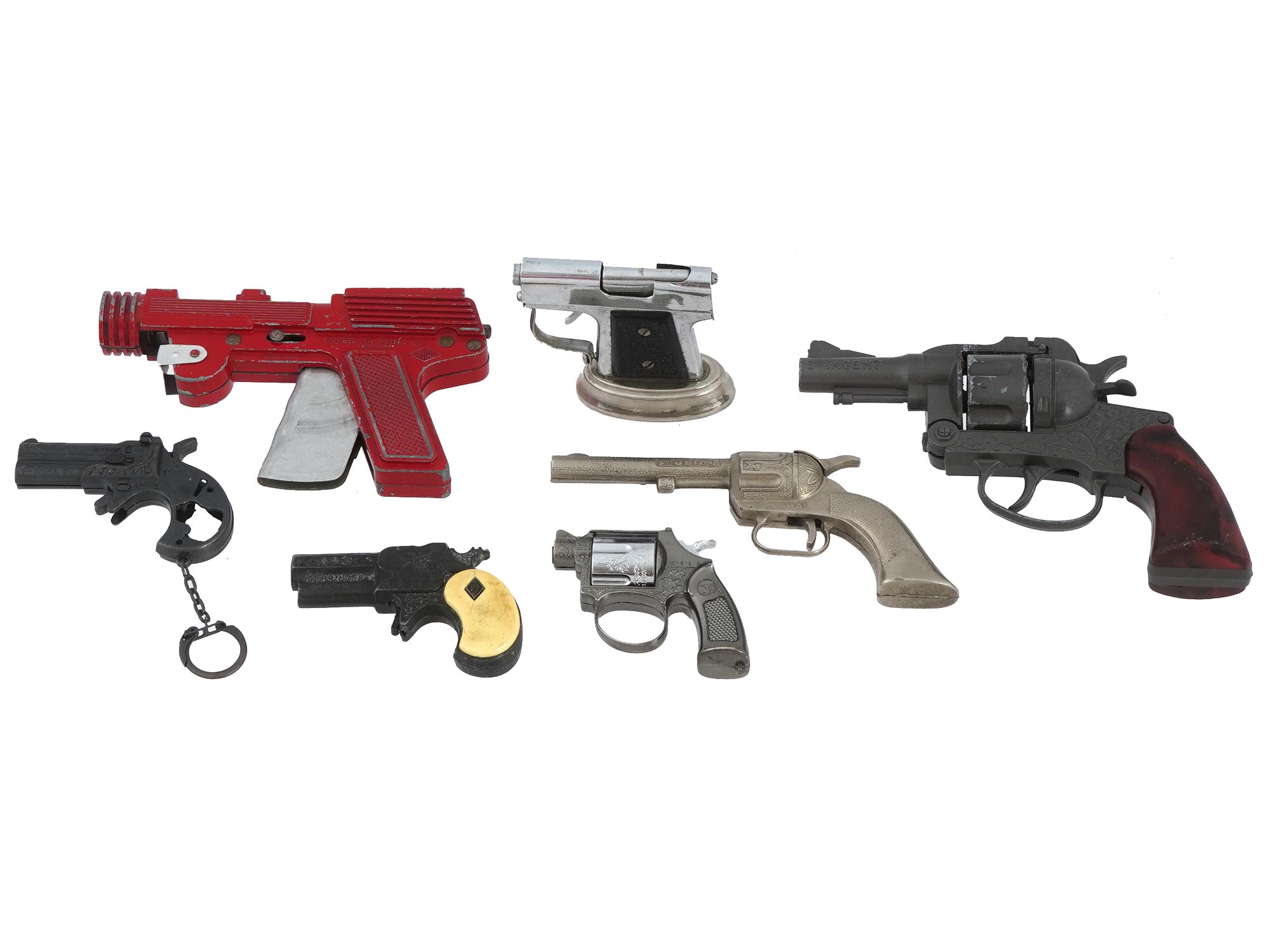 SEVEN VINTAGE TOY GUNS WITH UNIQUE DESIGNS PIC-0