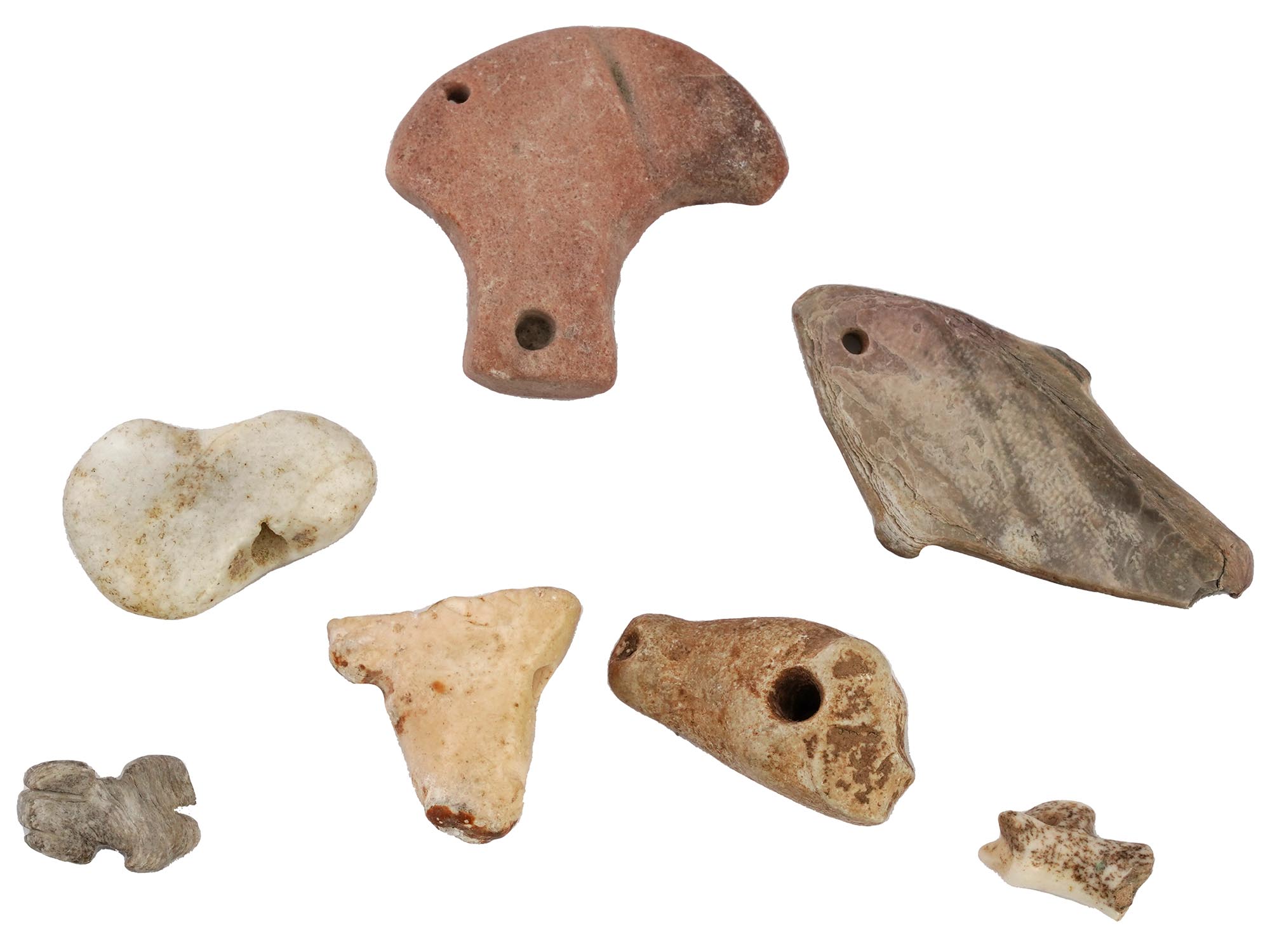 COLLECTION OF ANCIENT CARVED STONE PIERCED AMULETS PIC-1