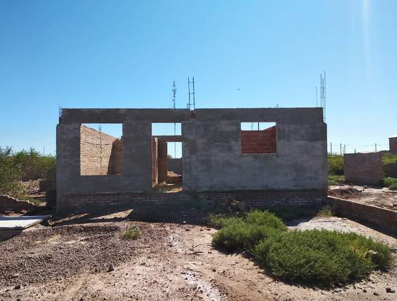 Lote más casa en construcción