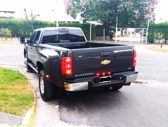 vendo chevrolet silverado negociable financiada