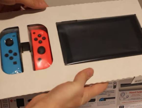 Nintendo Switch con 2 Mario Odyssey y Zelda Botw
