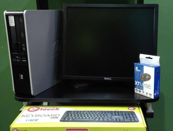 Pc completa HP con monitor de 19 pulgadas.