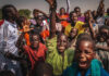 af children on a football pitch