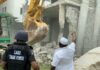 acbb pix gm lasbca arc. gbolahan oki and task force chairman csp shola jejeloye during the demolition. x