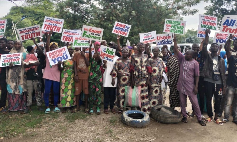 Activists protest in abuja warn against unfair verdict - nigeria newspapers online