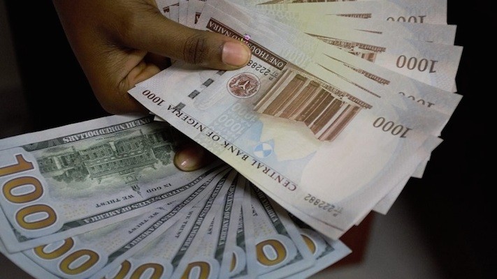 Naira makes fresh gains against dollar at official market