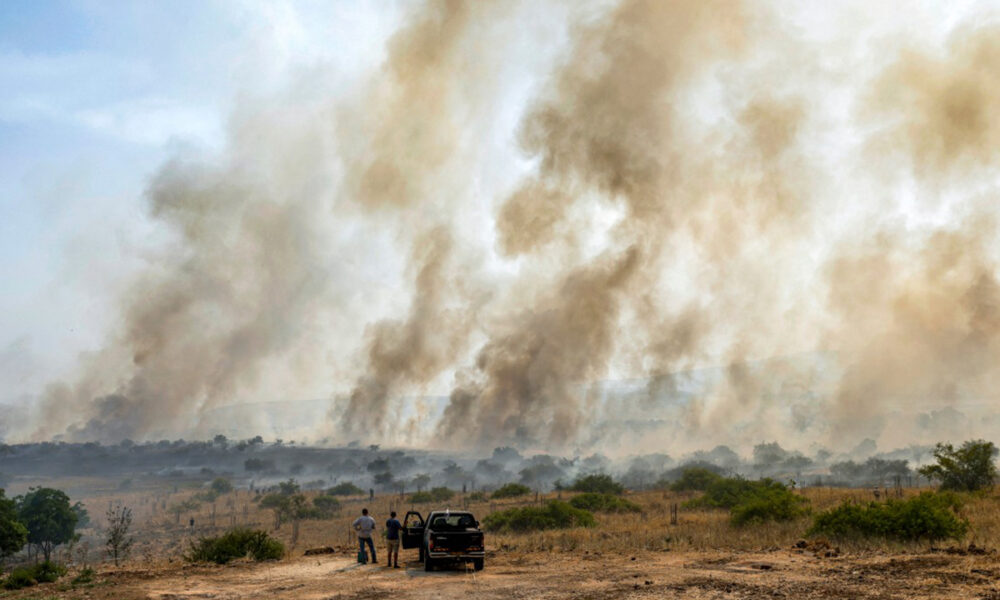 Hezbollah fires new barrage at Israel, which vows to hit back