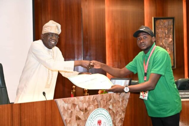 Student loan tinubu presents cheques to students as 103000 apply - nigeria newspapers online