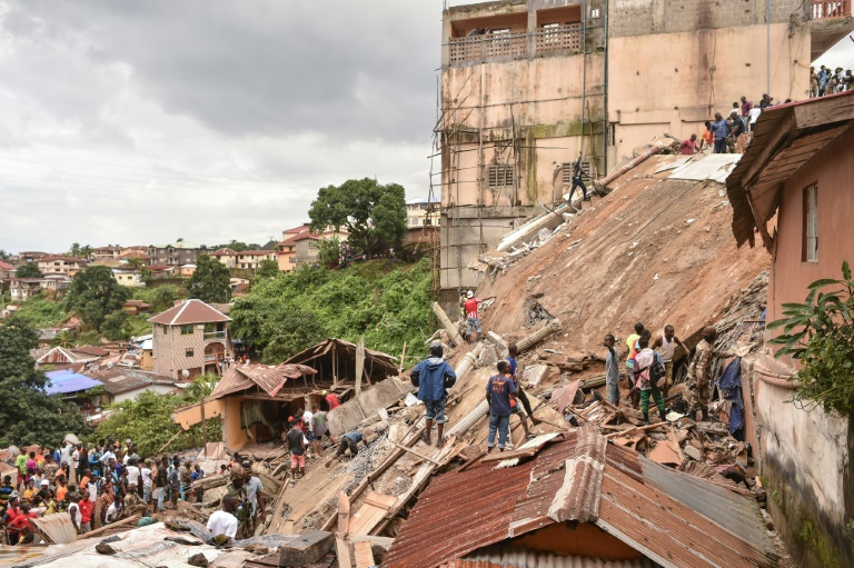 Rescuers race against time after freetown building collapse - nigeria newspapers online