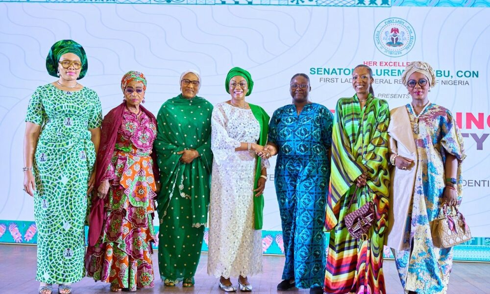 First lady unveils national unity fabric announces 25-year-old winner of #onenigeriaunityfabric competition - nigeria newspapers online