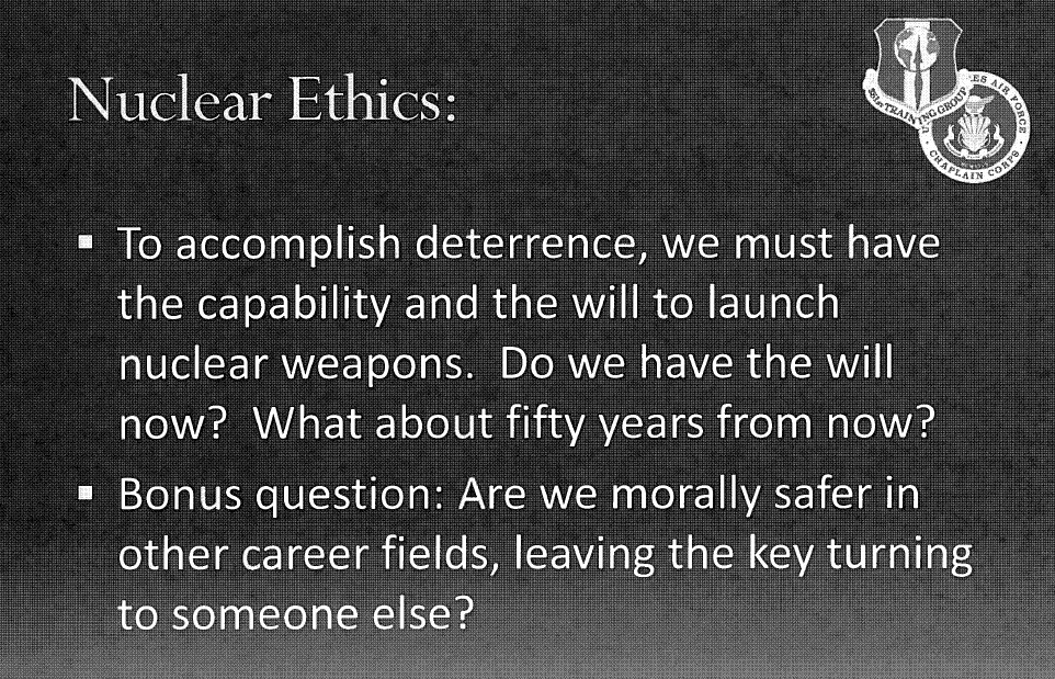 Slide with the title "Nuclear Ethics" and the text "To accomplish deterrence, we must have the capability and the will to launch nuclear weapons. Do we have the will now? What about fifty years from now?" and "Bonus question: Are we morally safer in other career fields, leaving the key turning to someone else?"