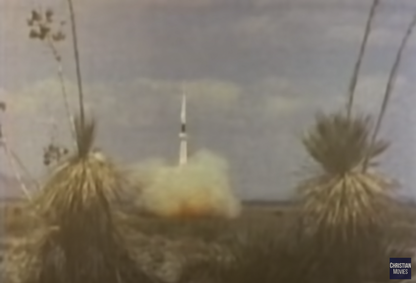 A missile launching in a desert landscape.