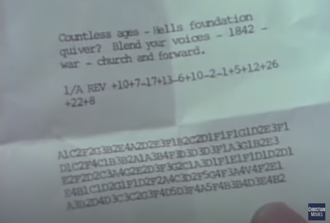 Paper holding a coded message that reads "Countless ages - Hells foundation quiver? Blend your voices - 1842 war - church and forward" then "1/A REV" and a bunch of numbers separated by pluses and minuses like a sweepstakes skill-testing question, and finally a block of hexademicals.