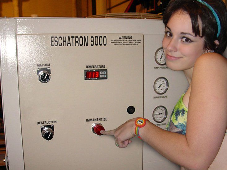 Young woman in a bikini about to press the “Immanentize” button on a machine labelled the “Eschatron 9000.”